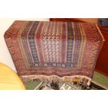 Mid 20thC Red ground Persian rug with Tassel ends