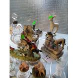 A Larry the Lamb ornament and other animal ornaments