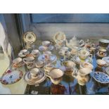 Various Royal Worcester, Wedgwood and other miniature cups, saucers and plates