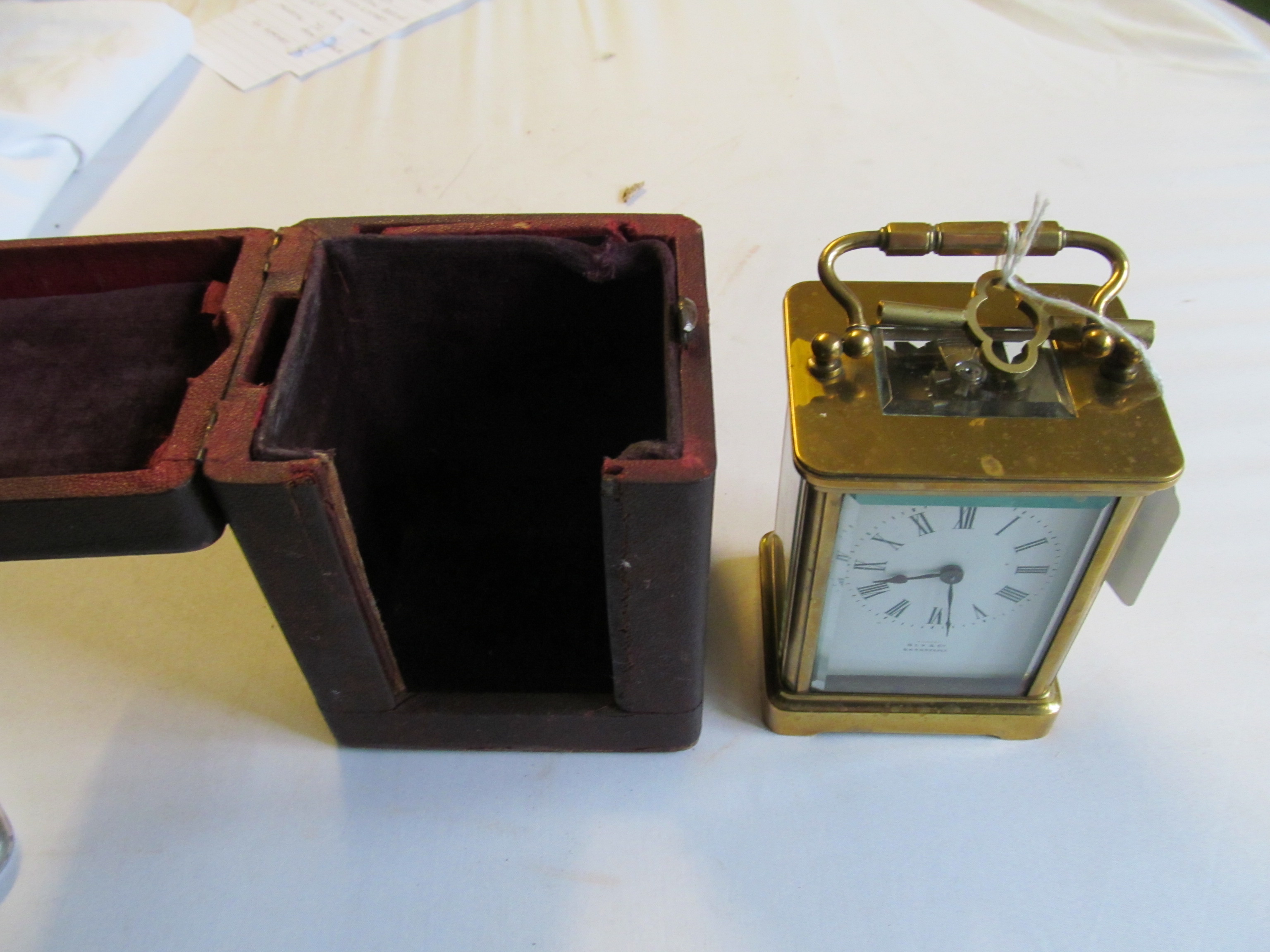 A brass carriage clock (i.c) with key