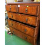 A 1930's walnut chest of two short and three long drawers