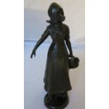 A spelter Dutch Girl.