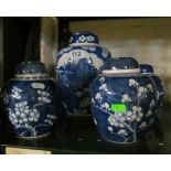 A blue and white Oriental ginger jar landscape scene and two prunus blossom ginger jars