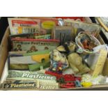 A collection of vintage toys including; teasets, jig-saws, washing machine, Plasticine, seaside