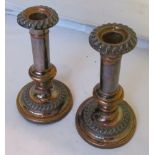 A pair of Sheffield plated candlesticks