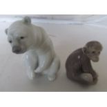 A Lladro Polar Bear and monkey