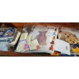 Various books and postcards on collecting bears
