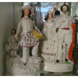 A Staffordshire flatback figure Queen and King of Sardinia (a/f) and another group Highland man