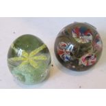 Two paperweights