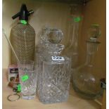Various glass decanters and a soda syphon
