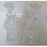 A pair of cut glass decanters shaped design (one a/f)