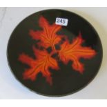 A Poole Pottery plate autumn leaf design, boxed