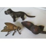 A metal dog nutcracker, brass box in the form of a fly and a treen nut and leaf container