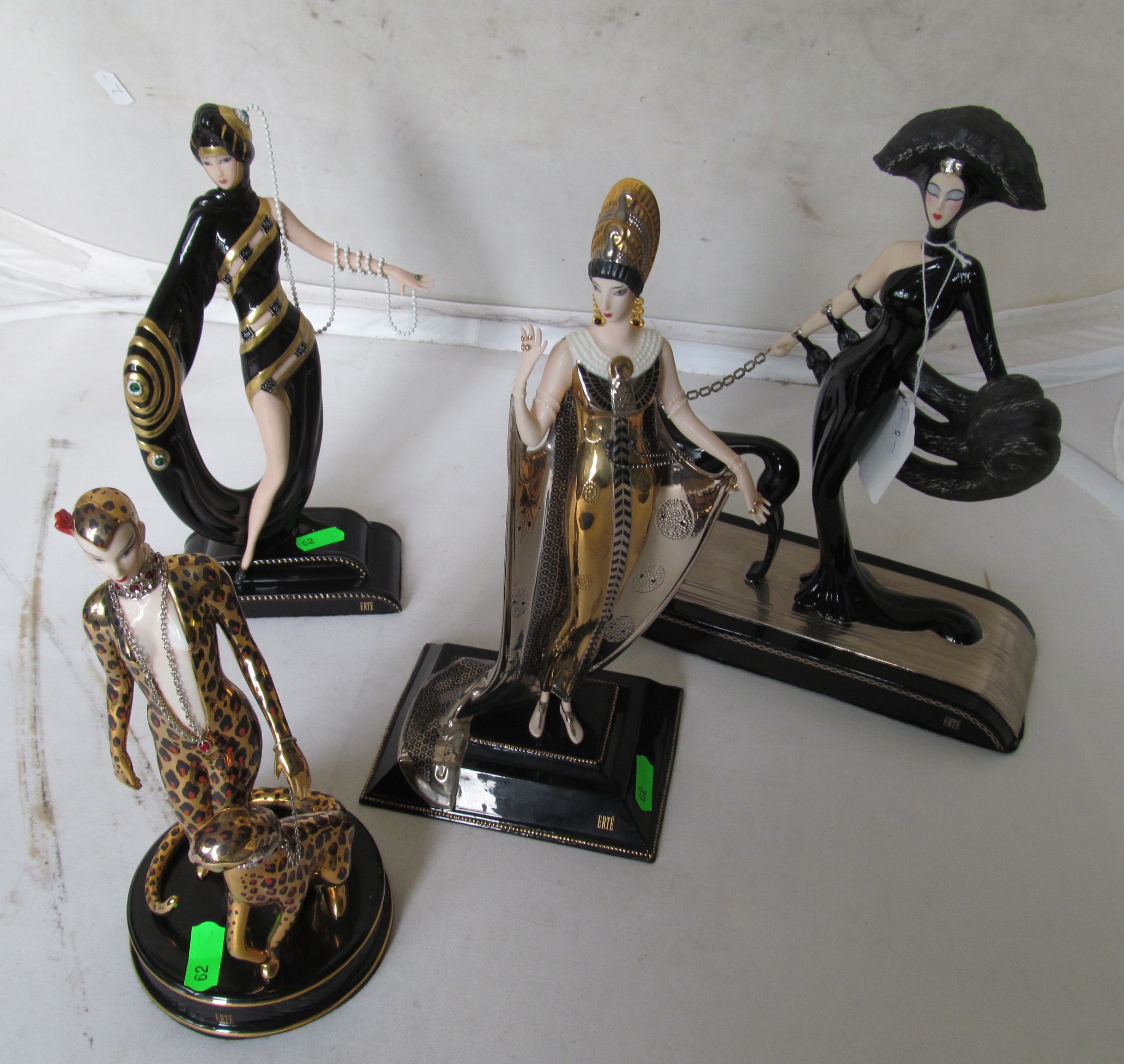 Four Franklin Mint limited edition Art Deco style porcelain figures.