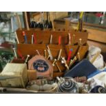 An ex-draper's shop wooden display box for Robinoid Super Knitting Pins with knitting needles,