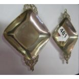 A pair of silver (London 1899) bon bon dishes with pierced handles by Henry Statford.