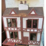A vintage doll's house, furniture and accessories
