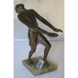 An Art Deco spelter figure lady with outstretched arms on onyx base