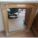 A gilt framed mirror