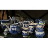 Various 19th Century blue and white jugs, teapots etc