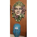 Two ceramic wall masks