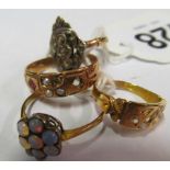 A 15ct gold gypsy set diamond ring and three other rings