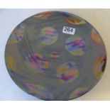 A Poole Pottery plate lustre design spots on silver coloured ground, boxed