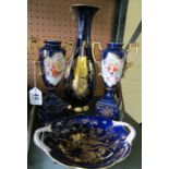 A Bavarian blue and gilt leaf vase, Coalport exotic bird dish and a pair of blue and floral vases on