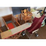 A plastic baby bath, cot, highchair, easel etc