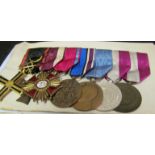 A group of Russian medals on bar with ribbons, a group of World War Two medals and a Lusitania