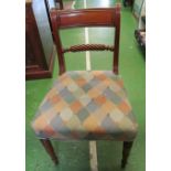 A set of four Regency ropetwist back dining chairs