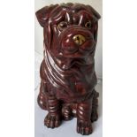 A possibly German pottery model of a Sharpei dog with painted eyes.