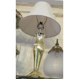 A gilt lamp with cream shade and an opaque glass ceiling light