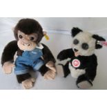A Steiff chimpanzee (boxed) and a panda (boxed)