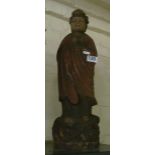 A wooden Chinese Buddha.