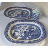 Two large Victorian willow pattern meat plates (one a/f) and a blue and white bottle