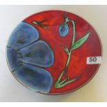 A Poole Pottery plate blue flower design, boxed