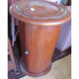 A 19th Century cylindrical bedside cabinet