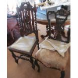 A pair of Edwardian salon chairs with carved floral backs and a pair of oak high back chairs