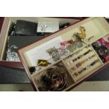 A box of costume jewellery.