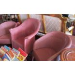 Three Lloyd Loom chairs and two linen baskets