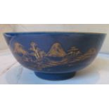 A 19th Century chinoiserie design bowl gilt pagoda scenes on blue ground
