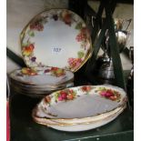 A German porcelain fruit set serving plate and five plates and two Old Country roses dishes
