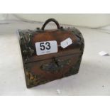 A small walnut and brass dome top box containing two glass bottles