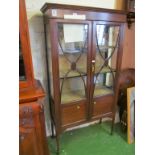 An Edwardian display cabinet