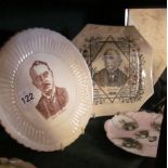 A commemorative plate Cecil Rhodes, another with portraits Baden Powell, Lord Roberts etc and