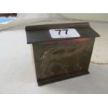 A small copper box with bulldog motif and two bulldog brooches