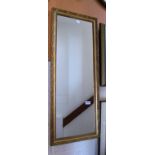 A gilt wall mirror