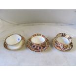 A 19th Century Derby Imari cup and two saucers (one a/f), six Royal Crown Derby cups and saucers and