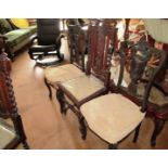 A pair of Edwardian salon chairs with carved floral backs and a pair of oak high back chairs